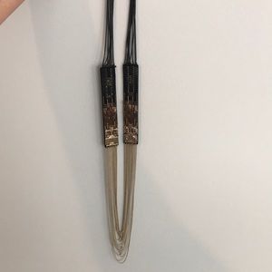 Gold and black necklace